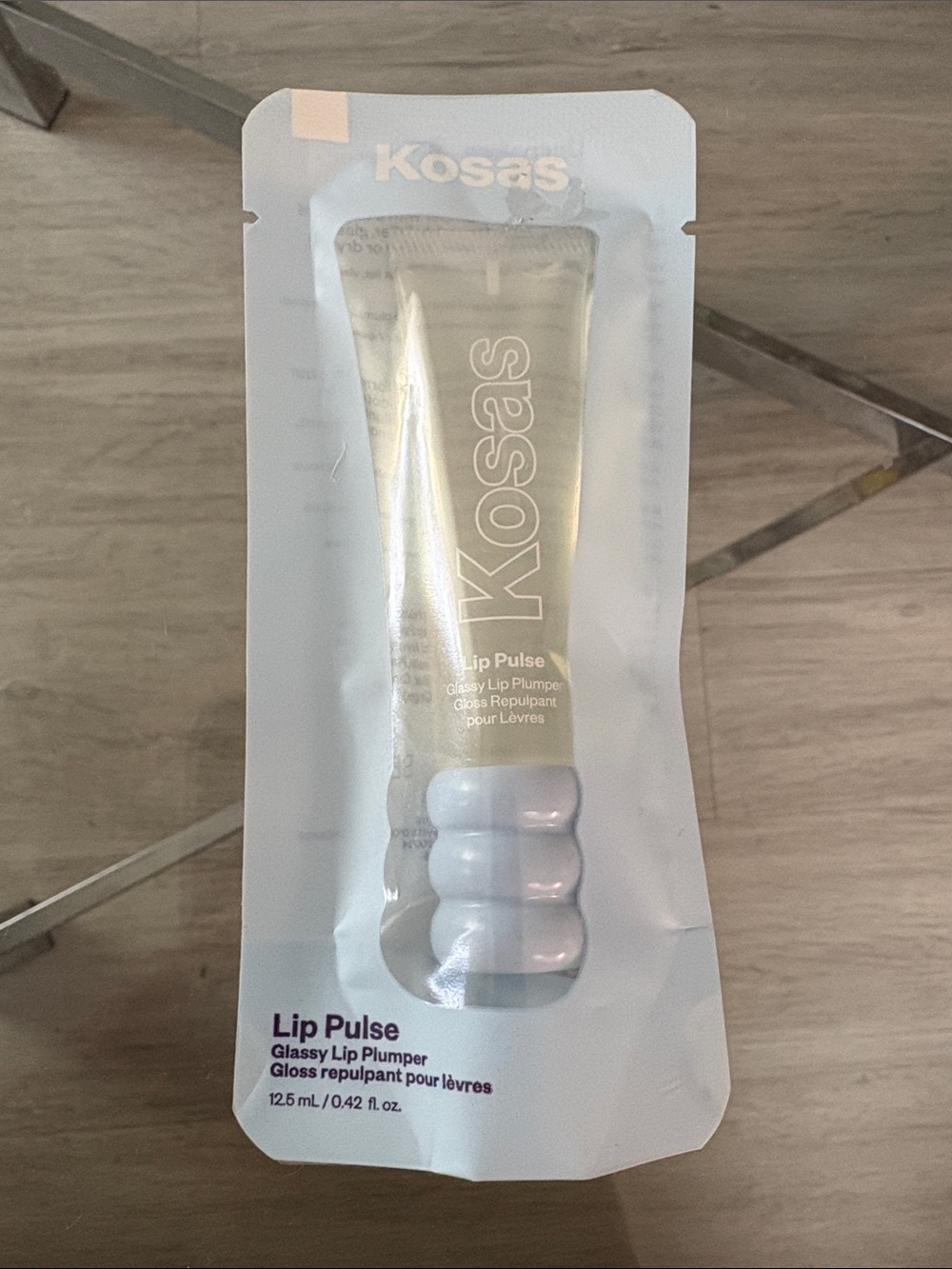 Kosas Lip Pulse Glassy Lip Plumper — Clear Gloss with Pale Lavender Cap